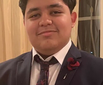 Mohammed Shaaban in a suit and tie